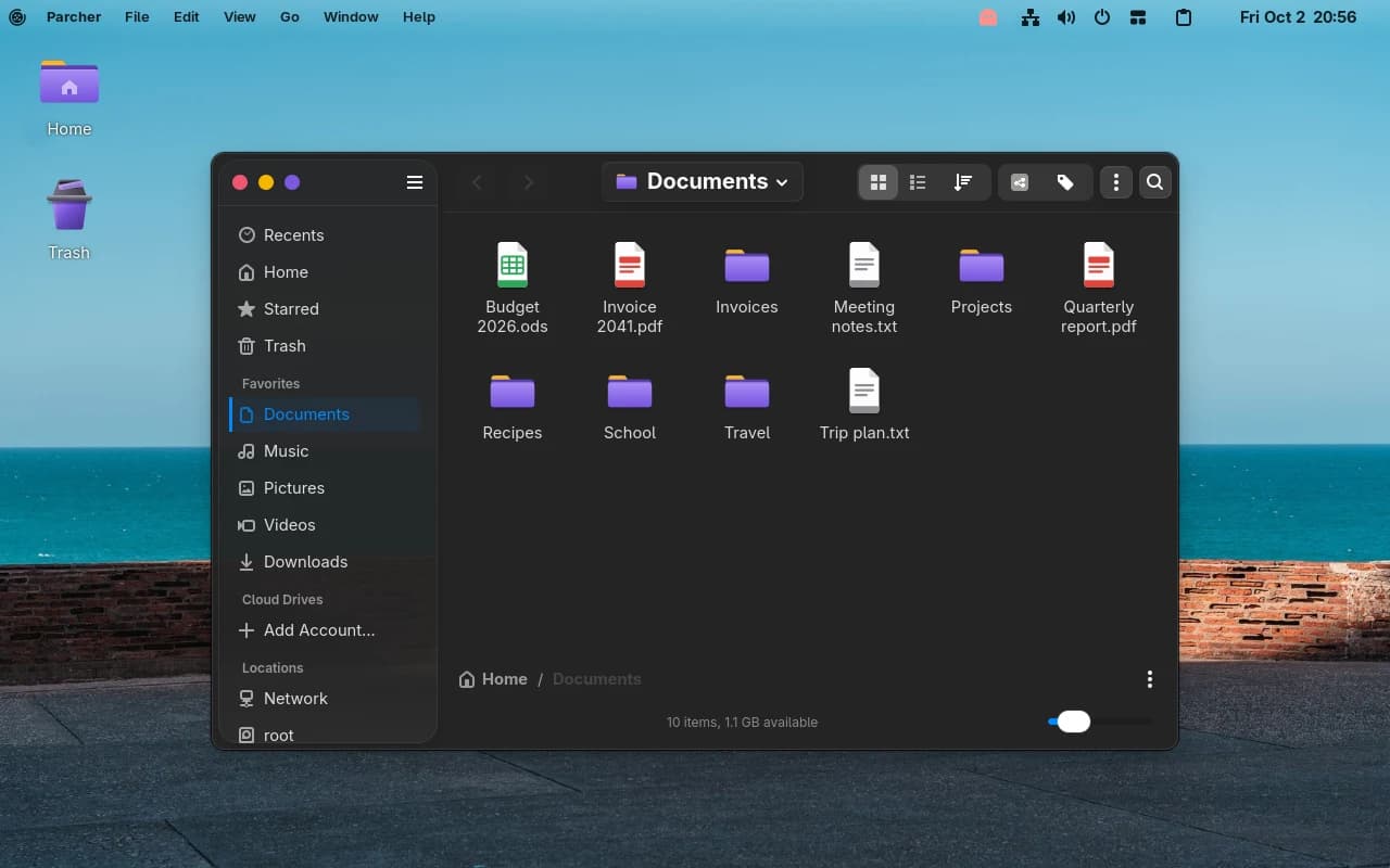 The ParchaOS desktop: menu bar on top, Parcher showing a Documents folder, and the dock at the bottom.
